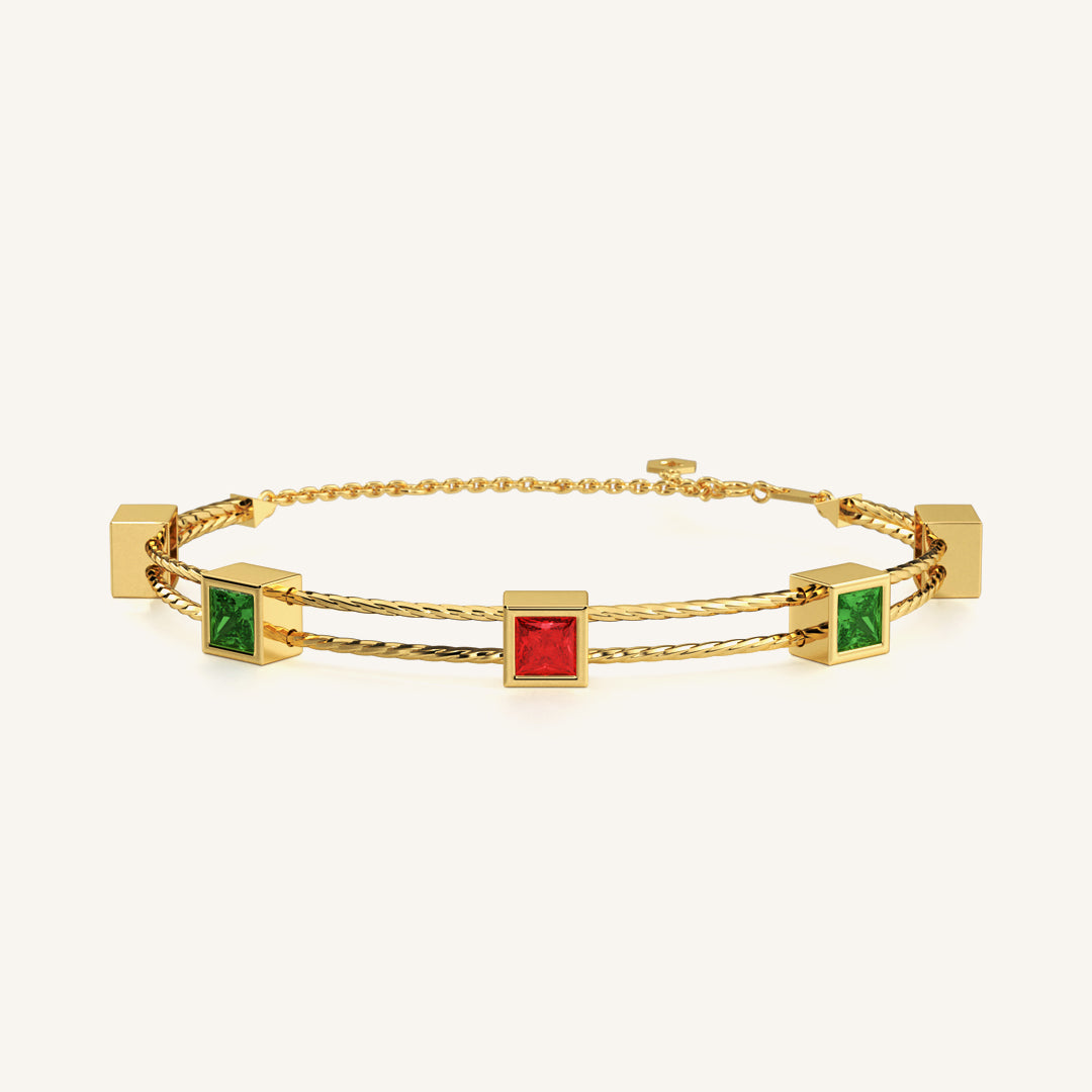 Gold Bracelet with Ruby and Emerald Gemstones by Noura