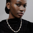 Modi Pearls Baroque Gul Necklace featuring baroque white pearls and blush pink round freshwater pearls, symbolizing timeless elegance and quiet luxury.