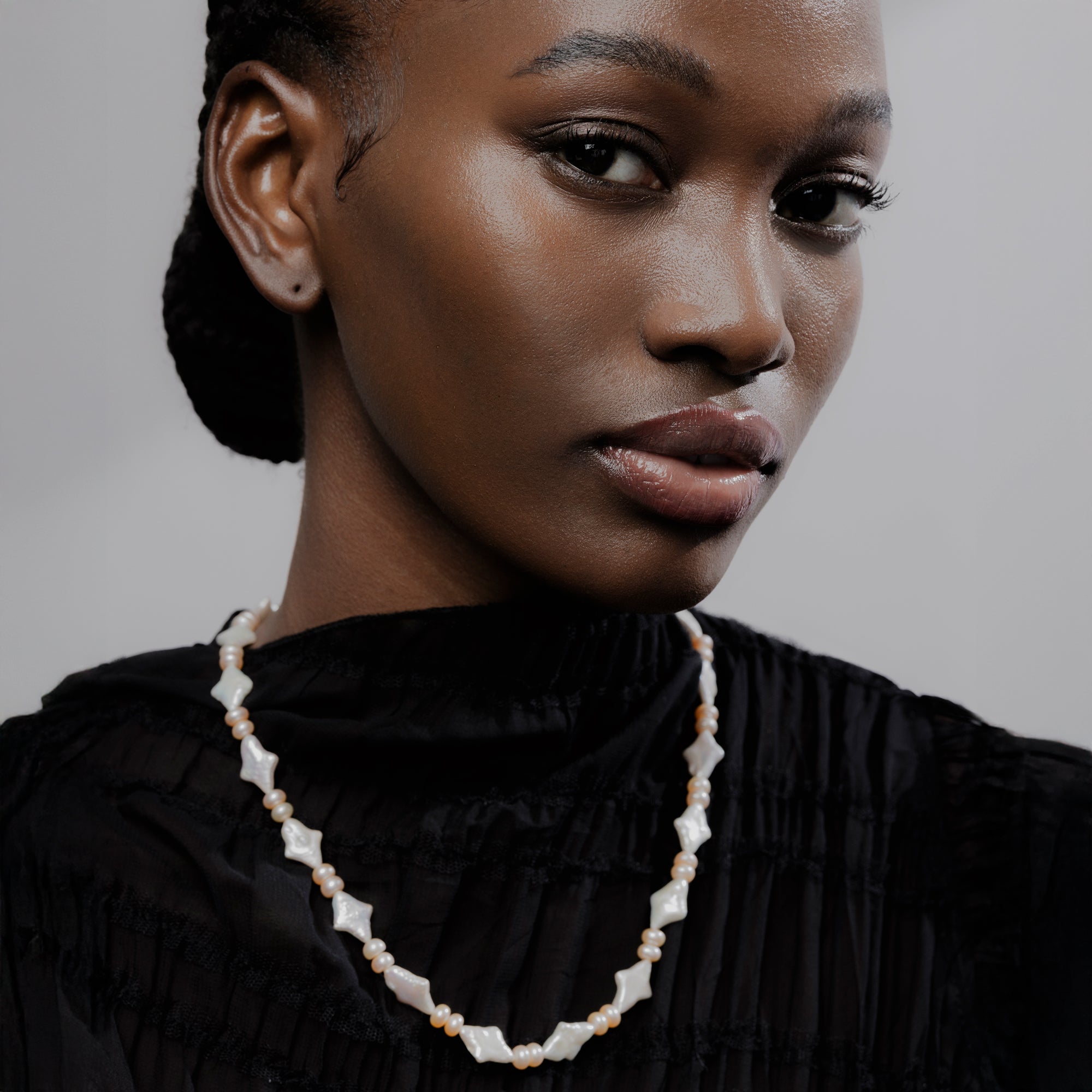 Modi Pearls Baroque Gul Necklace featuring baroque white pearls and blush pink round freshwater pearls, symbolizing timeless elegance and quiet luxury.