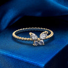 Delicate butterfly design ring with sparkling diamonds in 14K gold