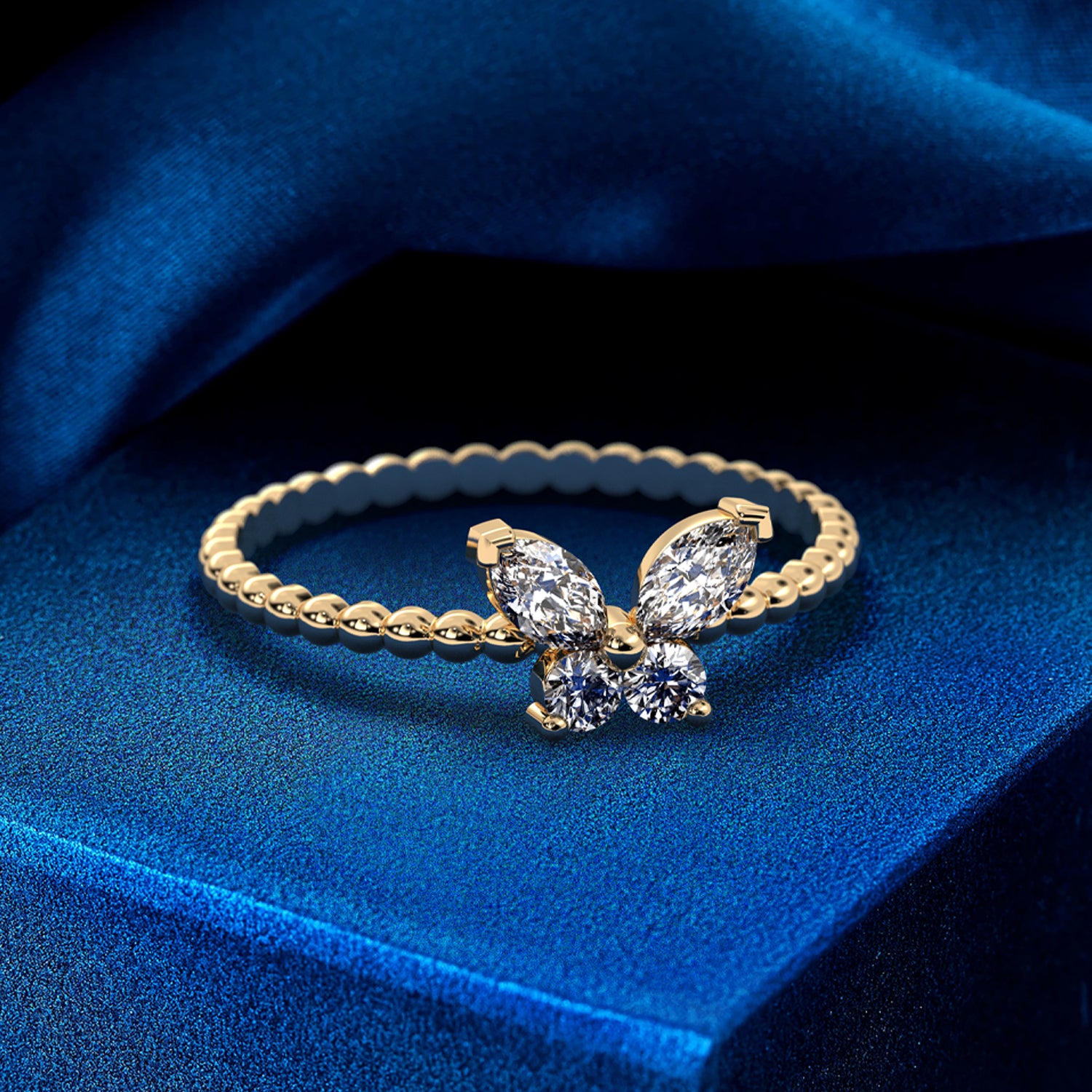 Delicate butterfly design ring with sparkling diamonds in 14K gold