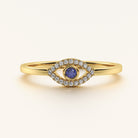14K gold evil eye ring with diamonds and blue gemstone center