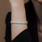KARP Halcyon Bracelet with round-cut diamonds in 18K white gold, symbolizing peace and elegance