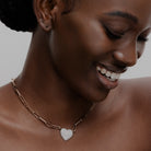 Elegant KARP Elysian Necklace with diamond-encrusted heart pendant, suspended from 18K rose gold chain.