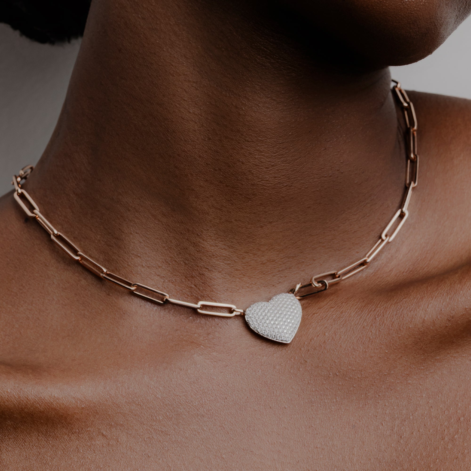 KARP Elysian Necklace in 18K rose gold with pavé diamond heart pendant, featuring 139 round-cut diamonds totaling 0.99 carats.