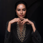 Elegant Verdant Panchjanya Necklace by Modi Pearls, combining AAA++ grade freshwater pearls with emerald accents, celebrating harmony and opulence.