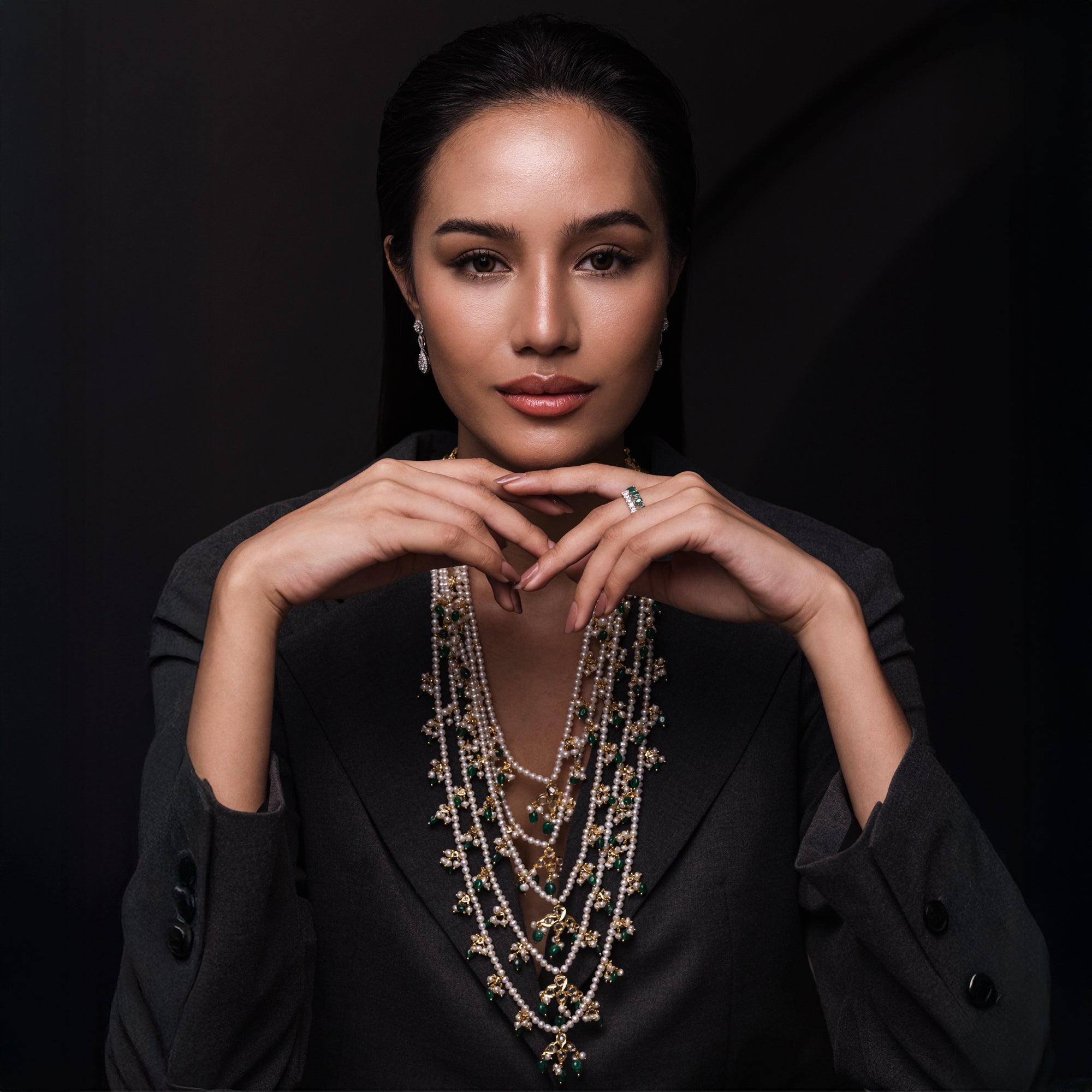 Elegant Verdant Panchjanya Necklace by Modi Pearls, combining AAA++ grade freshwater pearls with emerald accents, celebrating harmony and opulence.