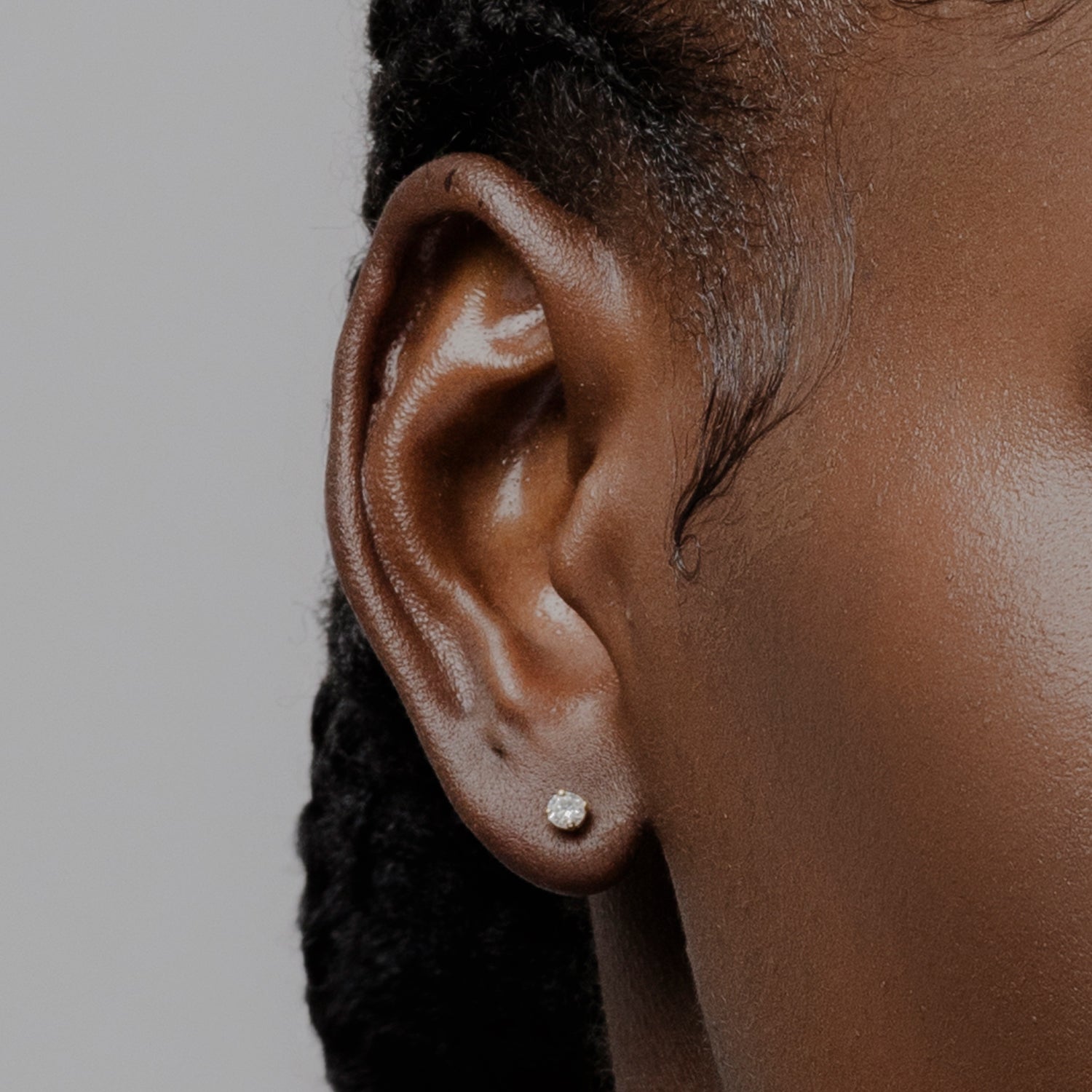 Elegant .70 carat diamond studs with secure screwback design – crafted by GH