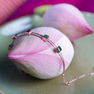 Noura Dazzling Gold Bracelet Featuring Emeralds and Rubies