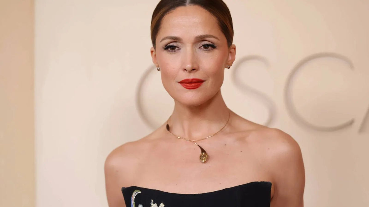 Rose Byrne at the 2026 Oscars wearing a Taffin necklace with a fancy yellow-brown diamond