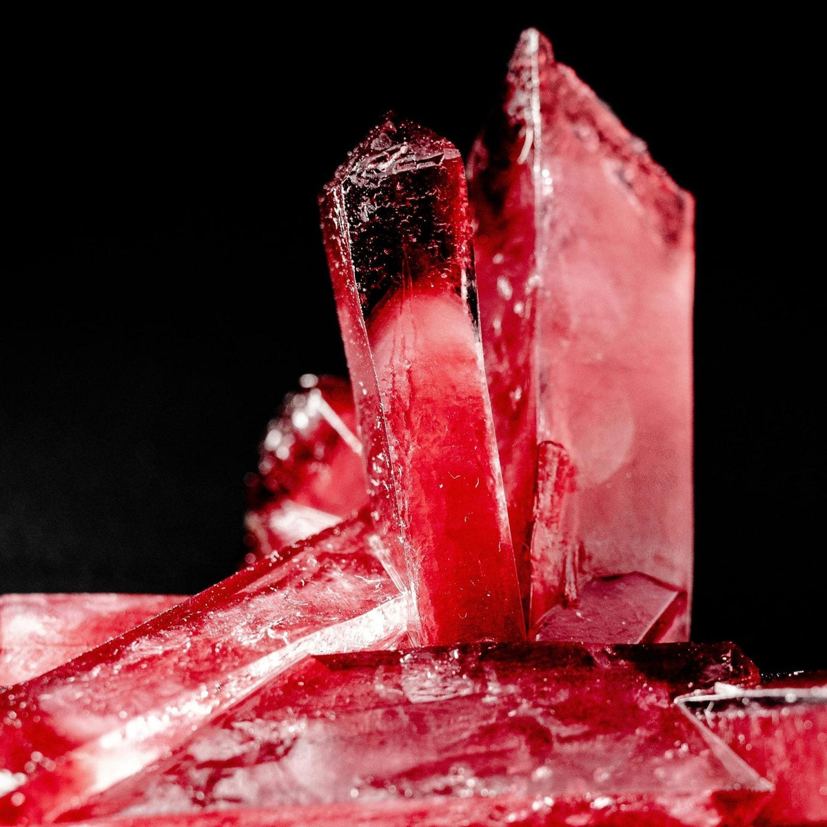 Macro photograph of a deep red crystal specimen